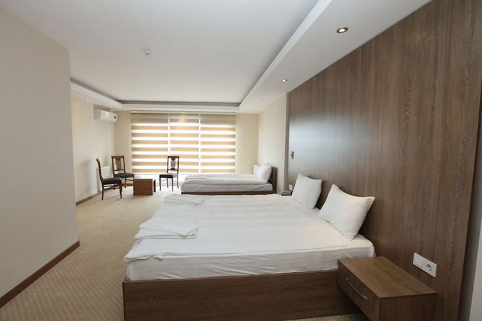 Imagen de la habitación del Ny World Hotel. Foto 11