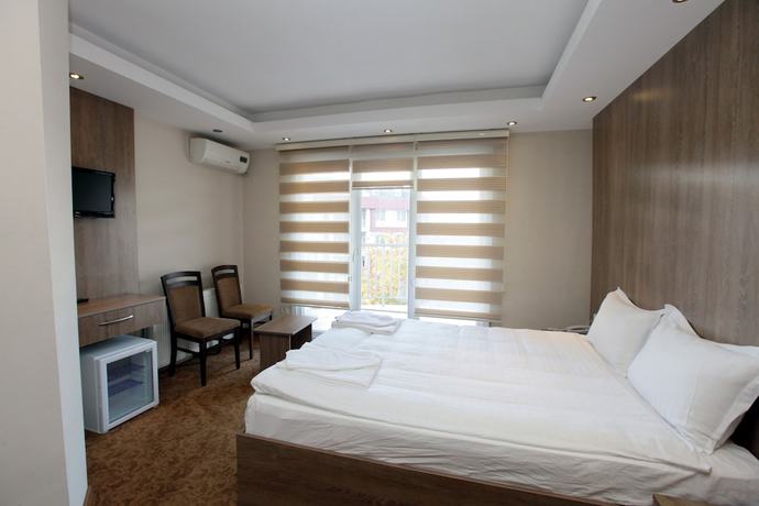 Imagen de la habitación del Ny World Hotel. Foto 14