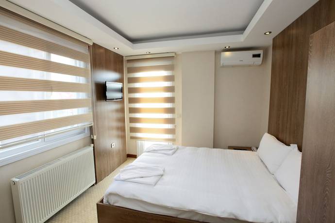 Imagen de la habitación del Ny World Hotel. Foto 15
