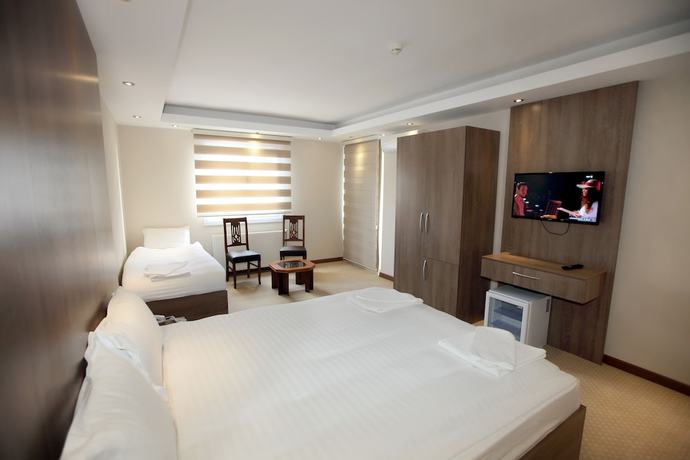 Imagen de la habitación del Ny World Hotel. Foto 16