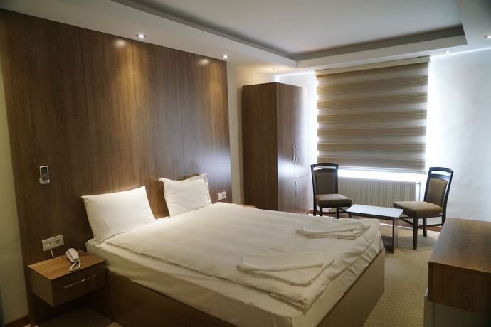 Imagen de la habitación del Ny World Hotel. Foto 17