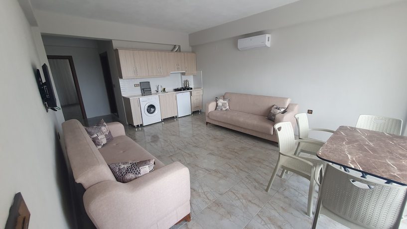 Imagen de la habitación del OLIVE TREE APART HOTEL. Foto 6