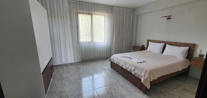 Imagen de la habitación del OLIVE TREE APART HOTEL. Foto 7