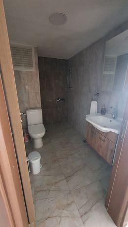 Imagen de la habitación del OLIVE TREE APART HOTEL. Foto 8