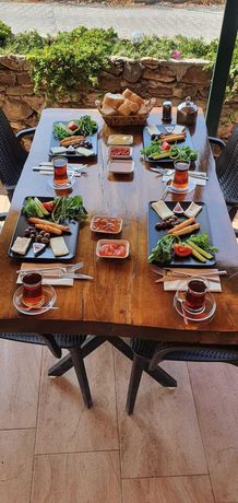 Imagen del bar/restaurante del OLIVE TREE APART HOTEL. Foto 4