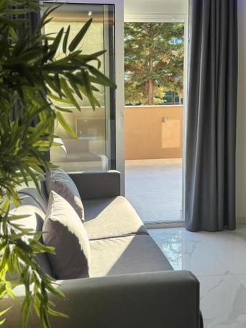 Imagen de la habitación del OLYMPIADA GIRNI Suites. Foto 2