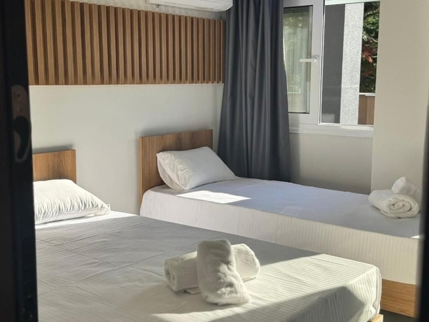 Imagen de la habitación del OLYMPIADA GIRNI Suites. Foto 3