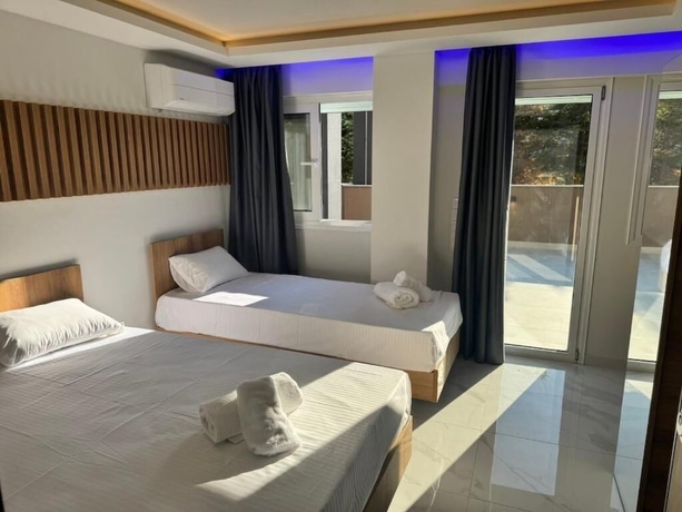 Imagen de la habitación del OLYMPIADA GIRNI Suites. Foto 4