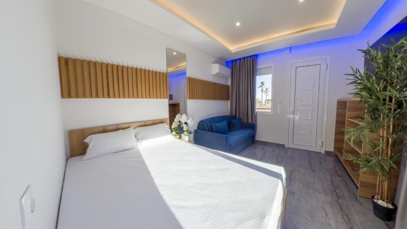 Imagen de la habitación del OLYMPIADA GIRNI Suites. Foto 5