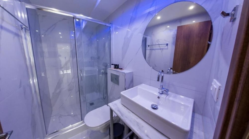 Imagen de la habitación del OLYMPIADA GIRNI Suites. Foto 8