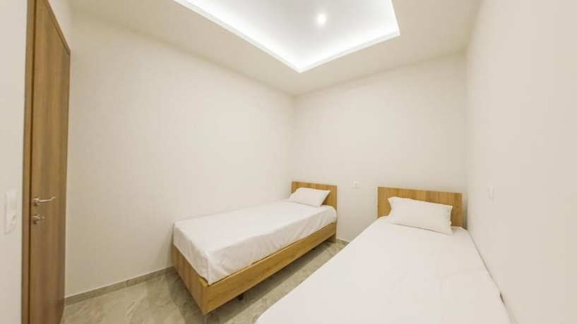 Imagen de la habitación del OLYMPIADA GIRNI Suites. Foto 9