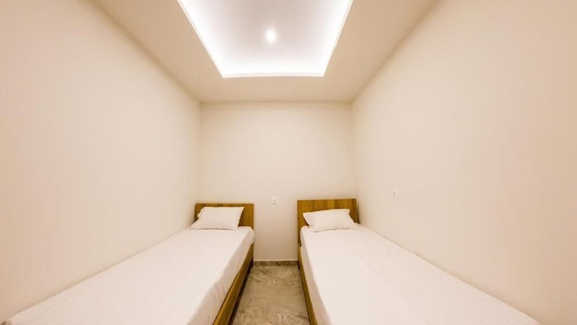 Imagen de la habitación del OLYMPIADA GIRNI Suites. Foto 10