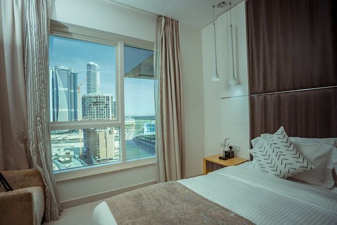 Imagen de la habitación del OSKENA Vacation Homes - Damac Maison Canal View. Foto 18