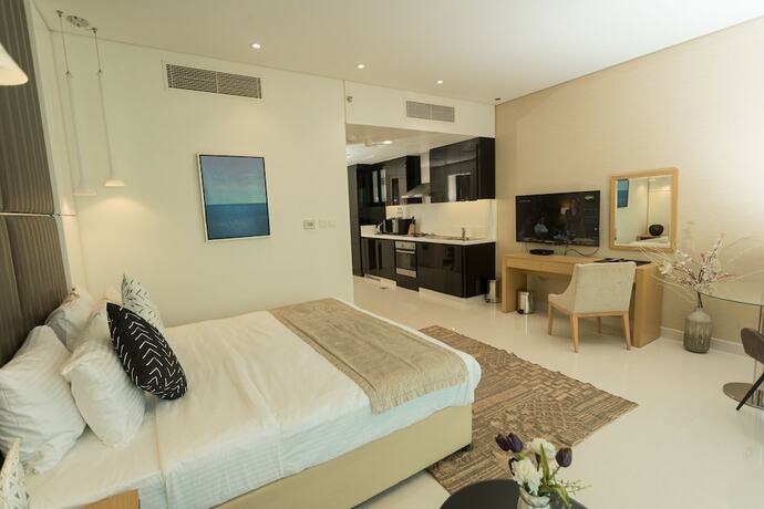Imagen de la habitación del OSKENA Vacation Homes - Damac Maison Canal View. Foto 20