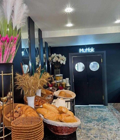 Imagen del bar/restaurante del OSMANİYE GARDEN OTEL. Foto 4