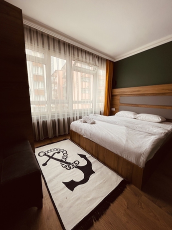 Imagen de la habitación del OTTO City Premium Suites. Foto 2