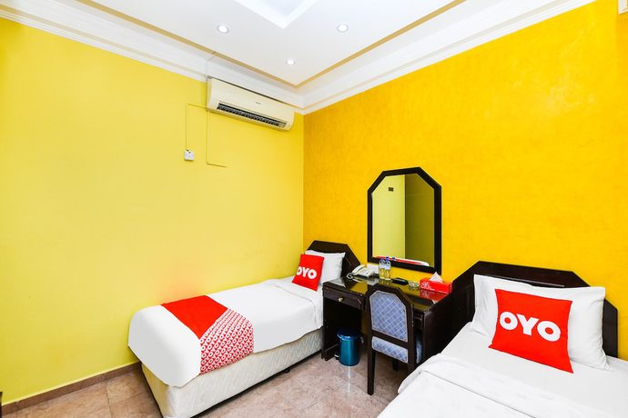 Imagen de la habitación del OYO 137 Marina Hotel. Foto 9