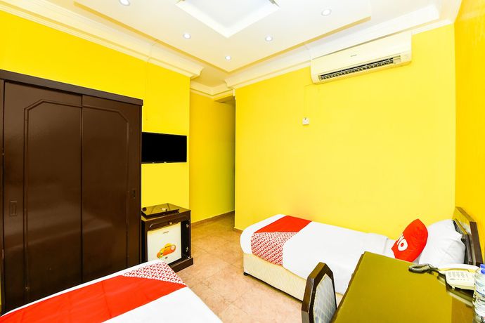 Imagen de la habitación del OYO 137 Marina Hotel. Foto 11