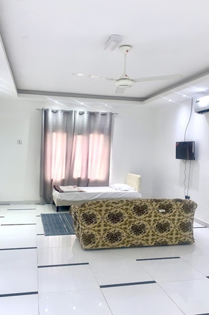 Imagen de la habitación del OYO 157 Dream Barka Hotel. Foto 6