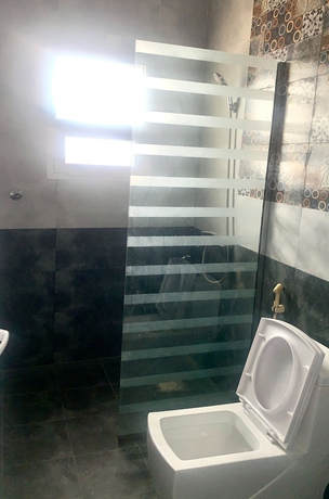 Imagen de la habitación del OYO 157 Dream Barka Hotel. Foto 7
