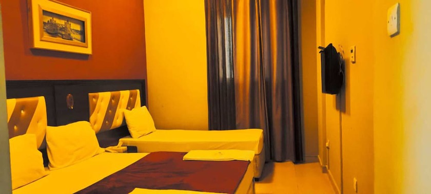 Imagen de la habitación del OYO 902 Prime Hotel Llc. Foto 8