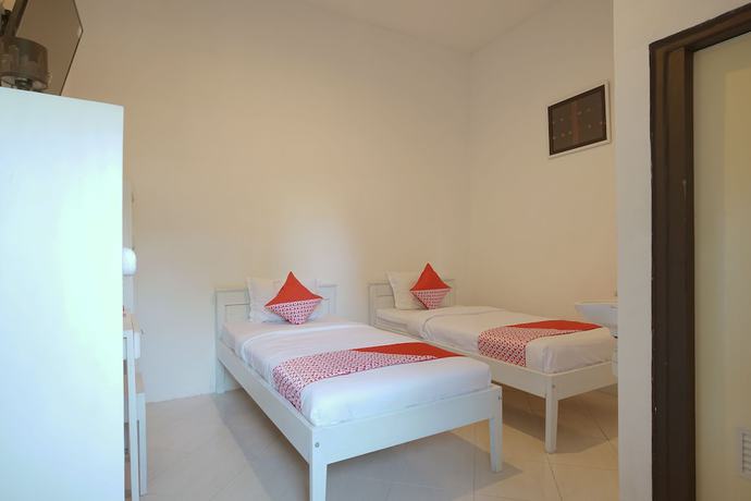 Imagen de la habitación del OYO 967 Cajoma Guesthouse. Foto 7