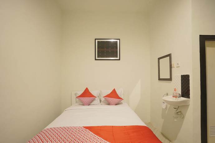 Imagen de la habitación del OYO 967 Cajoma Guesthouse. Foto 12