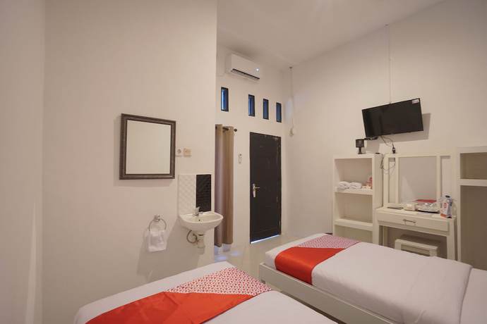 Imagen de la habitación del OYO 967 Cajoma Guesthouse. Foto 14
