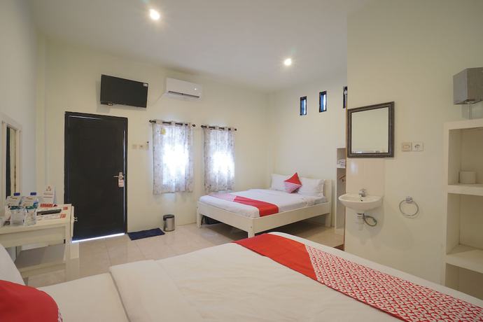 Imagen de la habitación del OYO 967 Cajoma Guesthouse. Foto 17