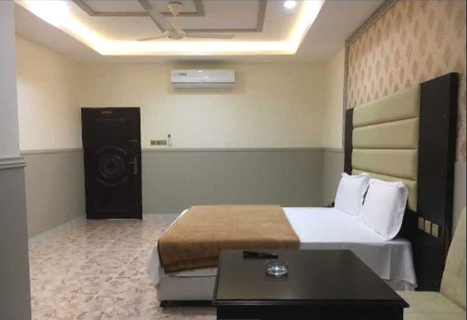 Imagen de la habitación del OYO Al Taj Rest House. Foto 5