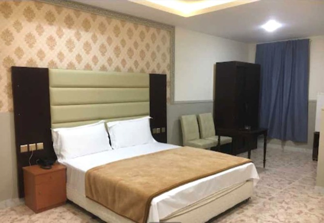 Imagen de la habitación del OYO Al Taj Rest House. Foto 6