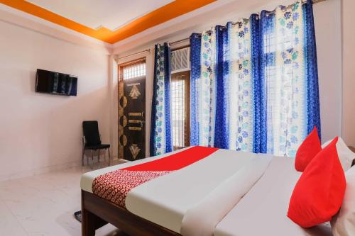 Imagen de la habitación del OYO Flagship Easy Homes. Foto 19