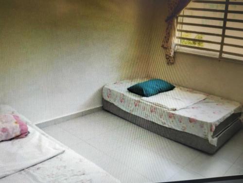 Imagen general del OYO Home 90977 AzZinki Homestay. Foto 2