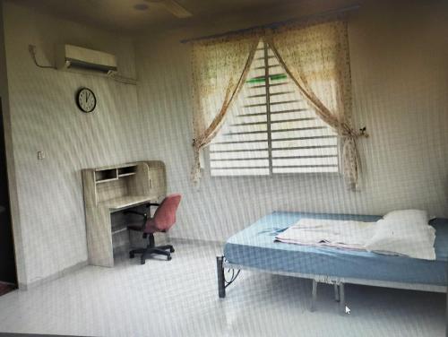 Imagen general del OYO Home 90977 AzZinki Homestay. Foto 3