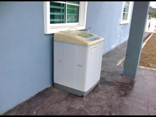 Imagen general del OYO Home 90977 AzZinki Homestay. Foto 6