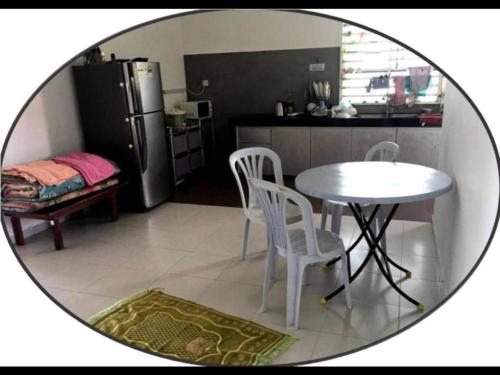 Imagen general del OYO Home 90977 AzZinki Homestay. Foto 8
