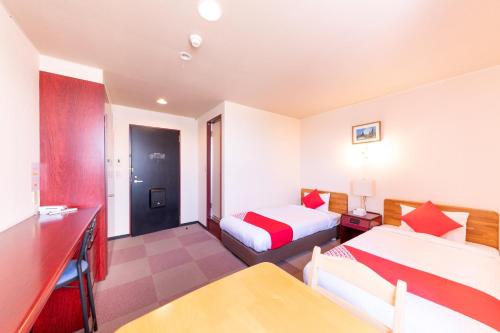 Imagen de la habitación del OYO Hotel Travel Inn Shinshu Nakano. Foto 8
