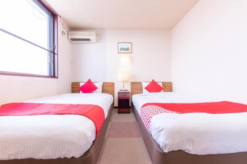 Imagen de la habitación del OYO Hotel Travel Inn Shinshu Nakano. Foto 10