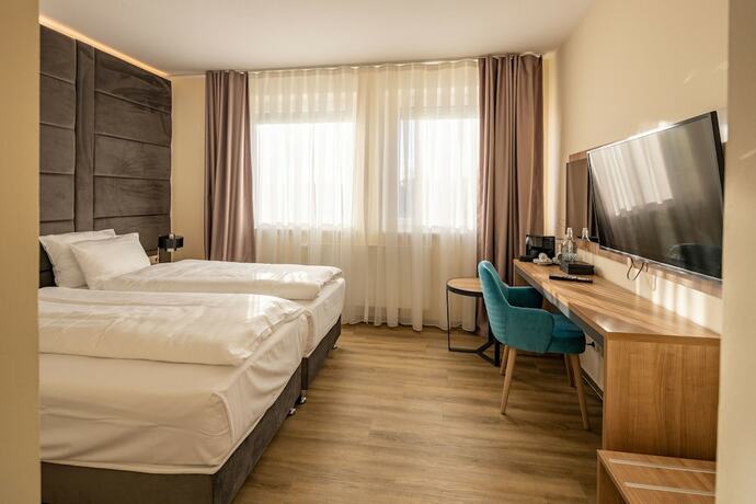 Imagen de la habitación del OandO Hotel Oberursel. Foto 12