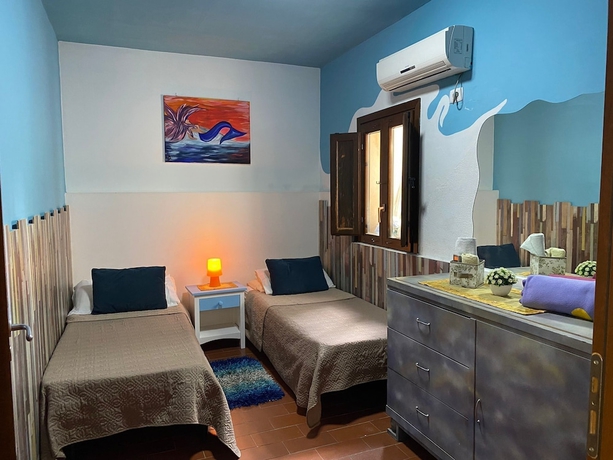 Imagen de la habitación del Oasi Residence Fiumefreddo. Foto 8