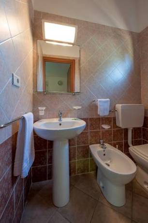 Imagen de la habitación del Oasimaremma Village. Foto 5