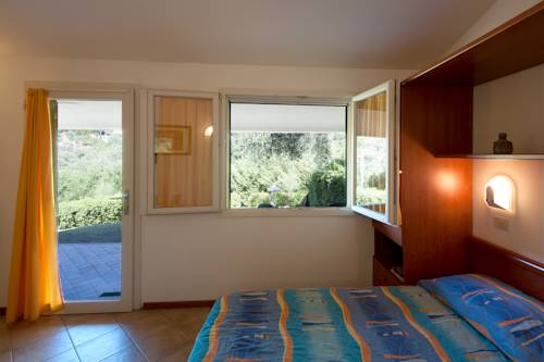 Imagen de la habitación del Oasimaremma Village. Foto 6