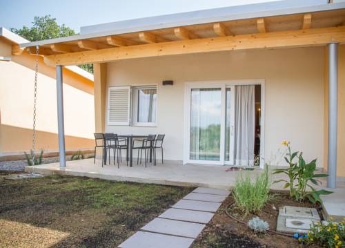 Imagen de la habitación del Oasimaremma Village. Foto 11