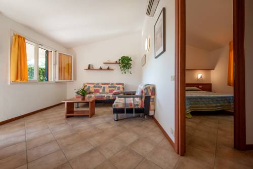 Imagen de la habitación del Oasimaremma Village. Foto 13
