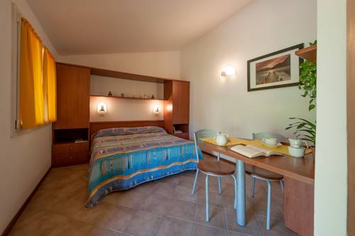 Imagen de la habitación del Oasimaremma Village. Foto 14