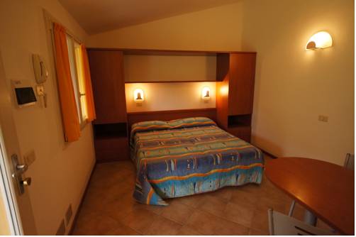 Imagen de la habitación del Oasimaremma Village. Foto 16
