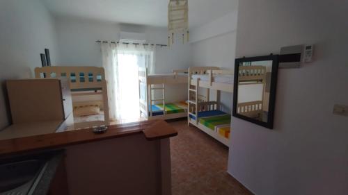 Imagen de la habitación del Oasis Hostel, Himar&euml;. Foto 20