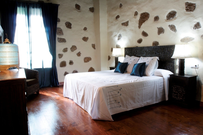 Imagen de la habitación del Oasis Hotel Boutique and Villas Casa Vieja. Foto 2