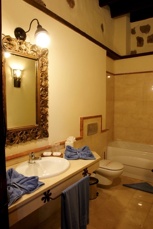 Imagen de la habitación del Oasis Hotel Boutique and Villas Casa Vieja. Foto 3