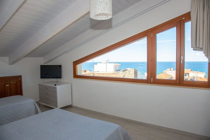 Imagen de la habitación del Odissea Residence e Rooms. Foto 13